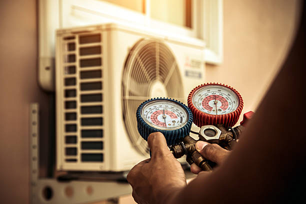 Professional Hvac technician working in Logan, UT